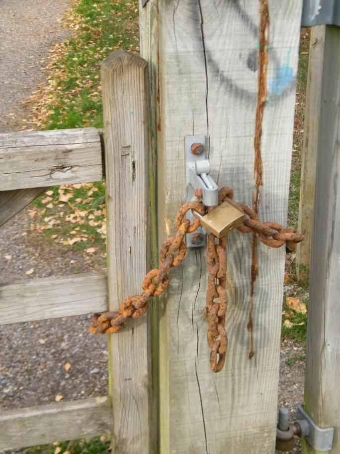 Vandalised main gate, click for a larger image